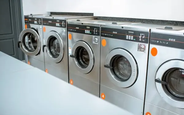 Commercial laundry machines in a row