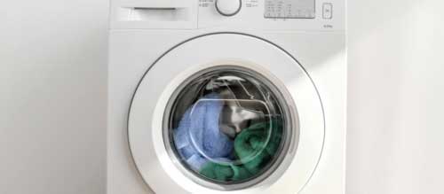 Placeholder image: washing machine that has shifted position and moved away from the wall