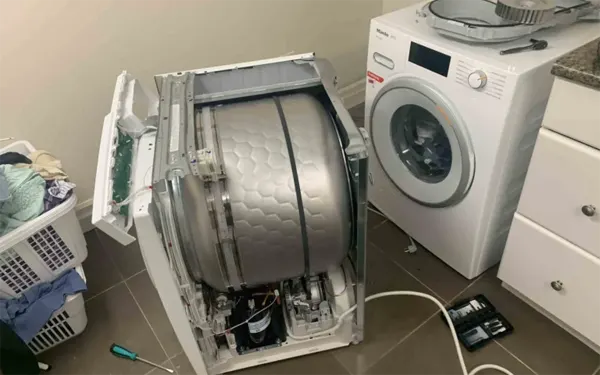 Front load washing machine in a laundry room